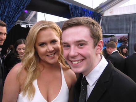 Amy Schumer posing for a selfie with a 17-year-old film critic Jackson Murphy
