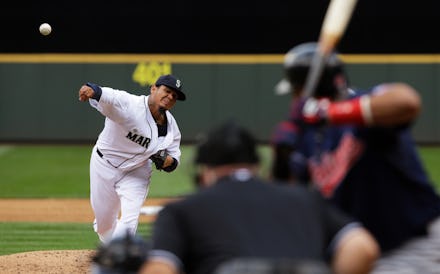 A baseball player throwing a ball