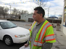 A worker in a safety vest