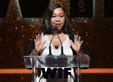 Shonda Rhimes standing behind a glass podium speaking about how to succeed in mans world