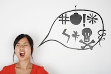 A woman cursing and an illustrated bubble with symbols representing curse words