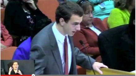 Ethan Young, a student at Farragut High School delivering an argument at a public school board meeti...