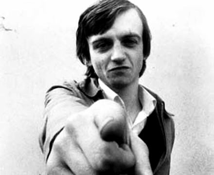 Mark E. Smith member of the fall pointing directly at camera