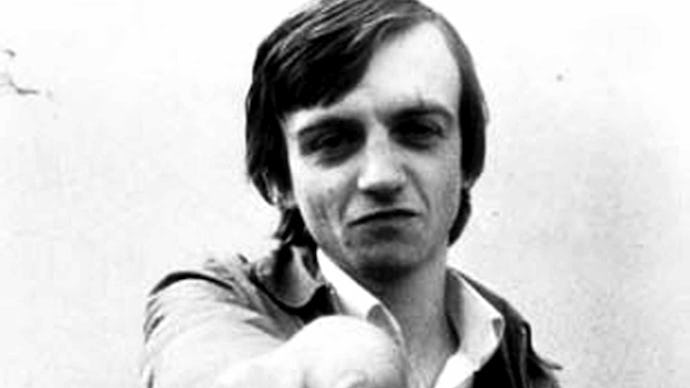 Mark E. Smith member of the fall pointing directly at camera