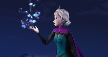 Elsa from Frozen looking to the side and touching snowflakes that are flying in circles above her ha...