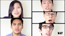 A group of people in front of a white background singing an a cappella medley