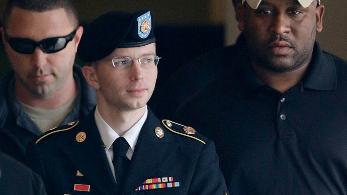 Chelsea Manning standing in his uniform