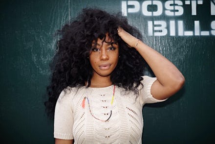 American singer SZA posing for a photo
