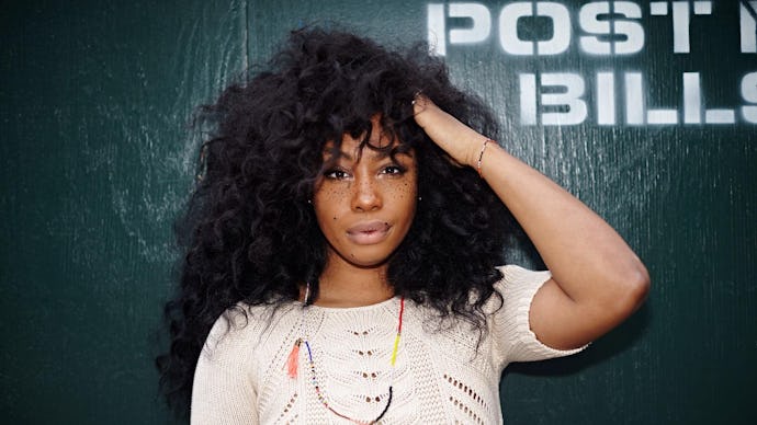 American singer SZA posing for a photo