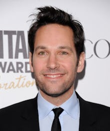 Paul Rudd, an American actor and the Ant man star, wearing a suit while posing on the red carpet