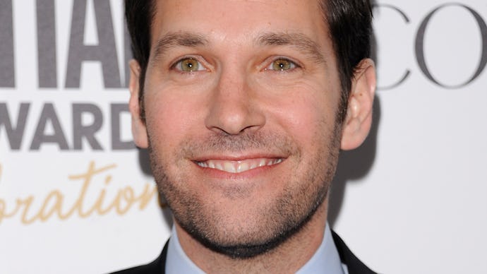 Paul Rudd, an American actor and the Ant man star, wearing a suit while posing on the red carpet