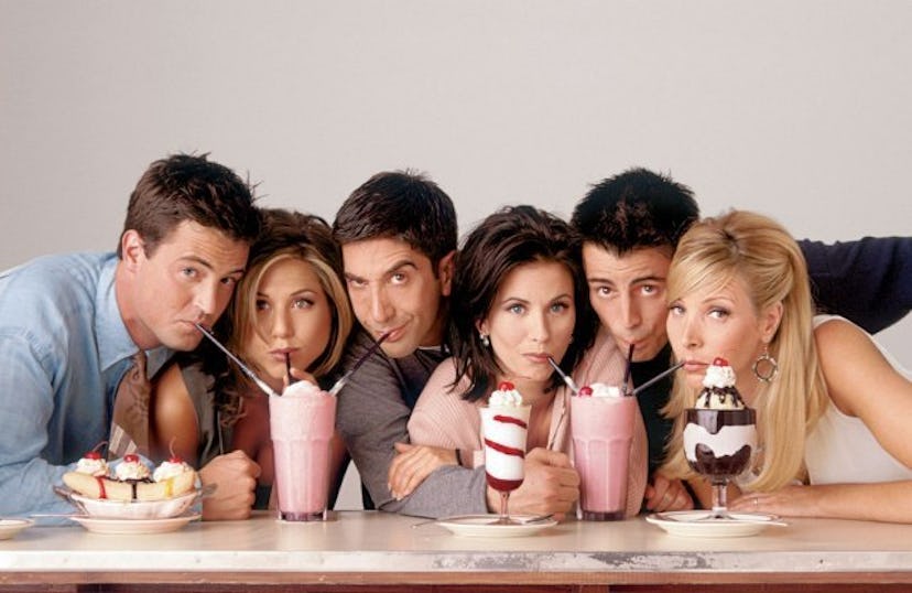 The cast of tv show Friends drinking a strawberry milkshake
