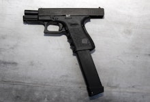 A black disassembled gun