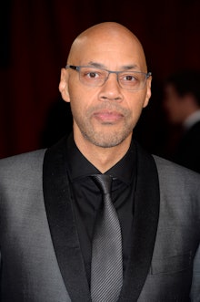 John Ridley in a black suit and tie at the 2014 oscars