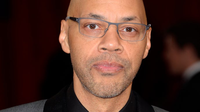 John Ridley in a black suit and tie at the 2014 oscars