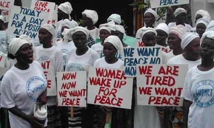 African women protesting against misogynist men by protesting on the streets and withholding sex fro...