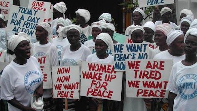 African women protesting against misogynist men by protesting on the streets and withholding sex fro...