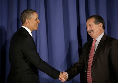 Obama shakes hands with Andrew Liveris, CEO of Dow Chemical Company