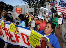 A group of people marching for a protest for the Immigration Reform in 2013