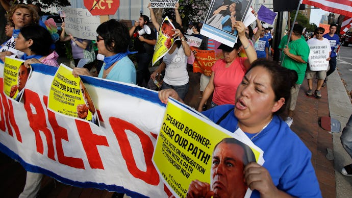 A group of people marching for a protest for the Immigration Reform in 2013
