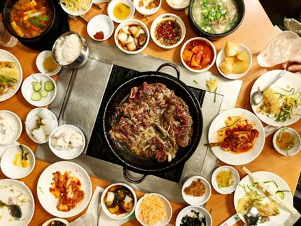 Many South Korean dishes served on small plates