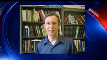 William Klug, UCLA Engineering Professor with a bookshelf in his background