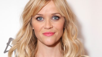 Reese Witherspoon in a black dress on a red carpet event