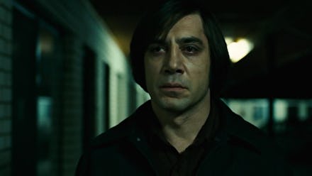 Javier Bardem in No Country For Old Men standing emotionless