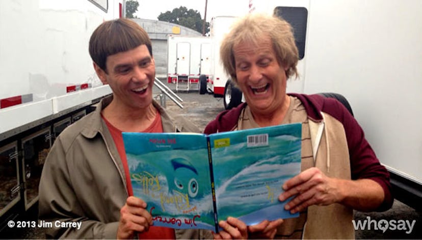 Jim Carrey and Jeff Daniels reading children book upside down