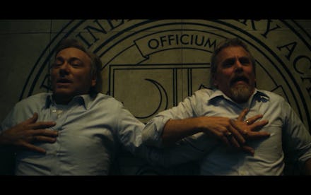 Kevin Spacey and David Andrews in House of Cards with Spacey feeling Andrews' heartbeat