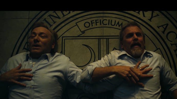 Kevin Spacey and David Andrews in House of Cards with Spacey feeling Andrews' heartbeat