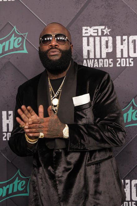 Rick ross in a black shirt and black blazer with sunglasses and gold chains at the BET hip hop award...