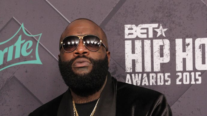 Rick ross in a black shirt and black blazer with sunglasses and gold chains at the BET hip hop award...