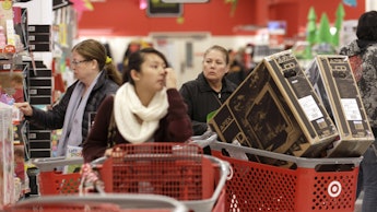 People shopping during Black Friday with their shopping carts full 