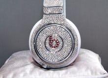 Bedazzled Beats by Dr. Dre  on a silver pillow 