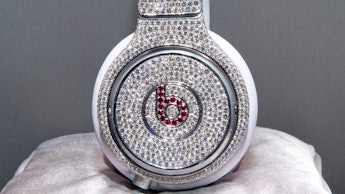 Bedazzled Beats by Dr. Dre  on a silver pillow 