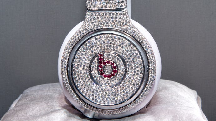 Bedazzled Beats by Dr. Dre  on a silver pillow 