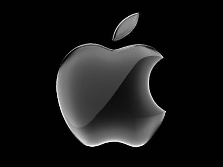 Grey Apple sign on a black background