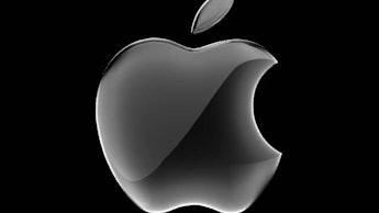Grey Apple sign on a black background