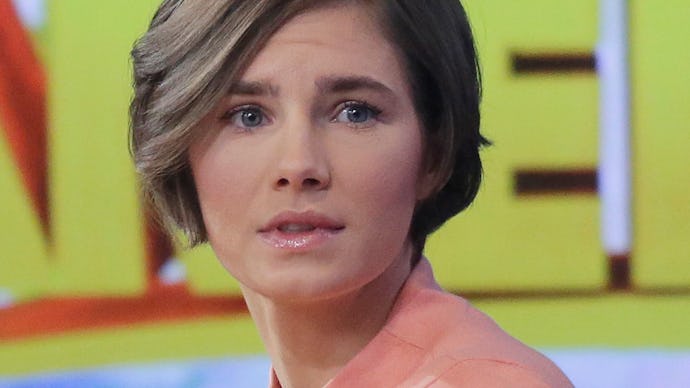 Amanda Knox with a short hair, wearing a pink t-shirt during an interview on ABC's 'Good Morning Ame...