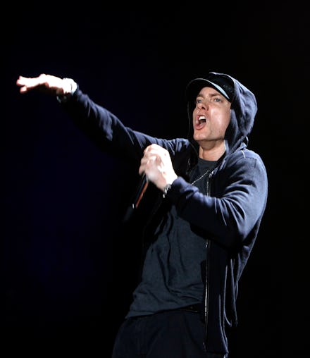 Eminem performing on a stage