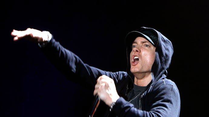 Eminem performing on a stage