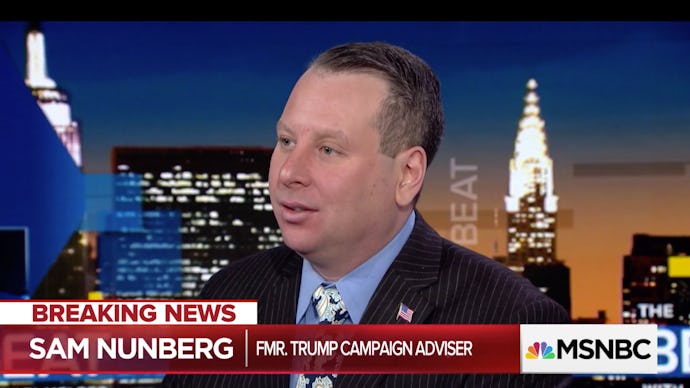Sam Nunberg in a suit giving an interview on msnbc