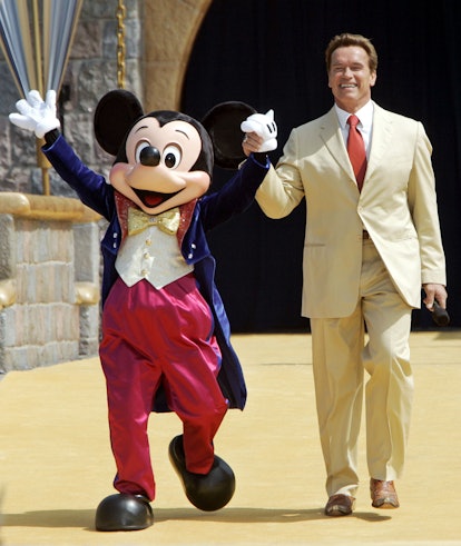 Arnold Schwarzenegger with Mickey Mouse at Disneyland