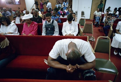 Sad people sitting at the court after the Rodney King verdict