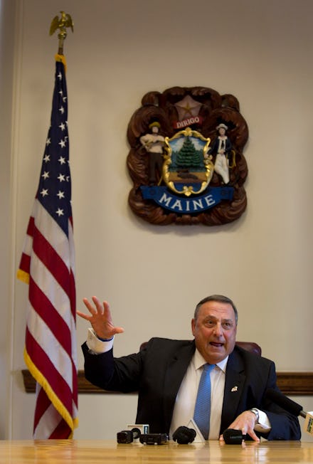 Republican Gov. Paul LePage of Maine looking angry at a press conference.