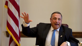 Republican Gov. Paul LePage of Maine looking angry at a press conference.