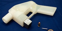 A white 3D printed gun that is now banned in the UK