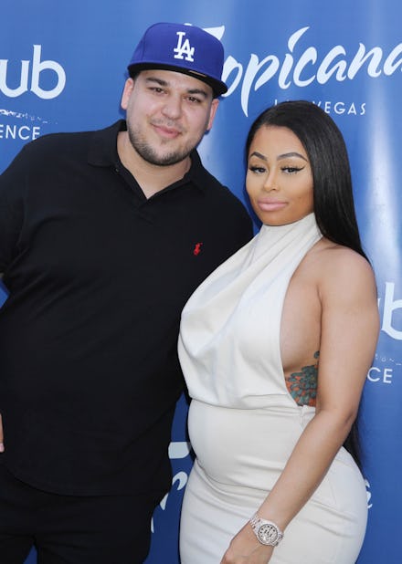 Rob Kardashian posing with Blac Chyna during a red carpet event in Las Vegas