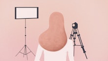 An illustration of a woman standing naked in front of a camera and a light source